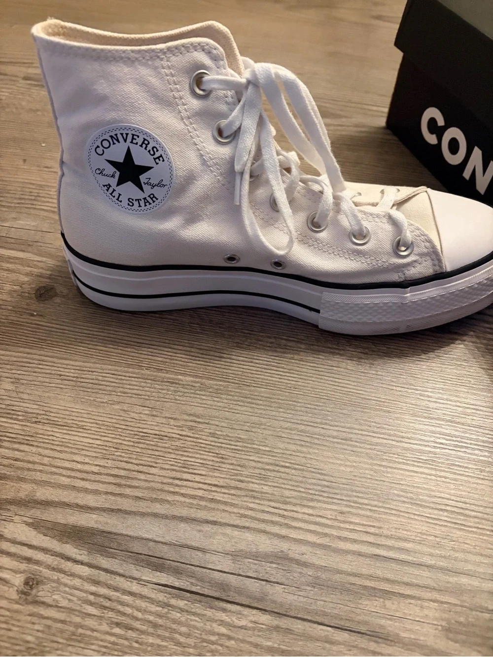 Converse Women’s White High-Top Platform Sneakers with Black Accent